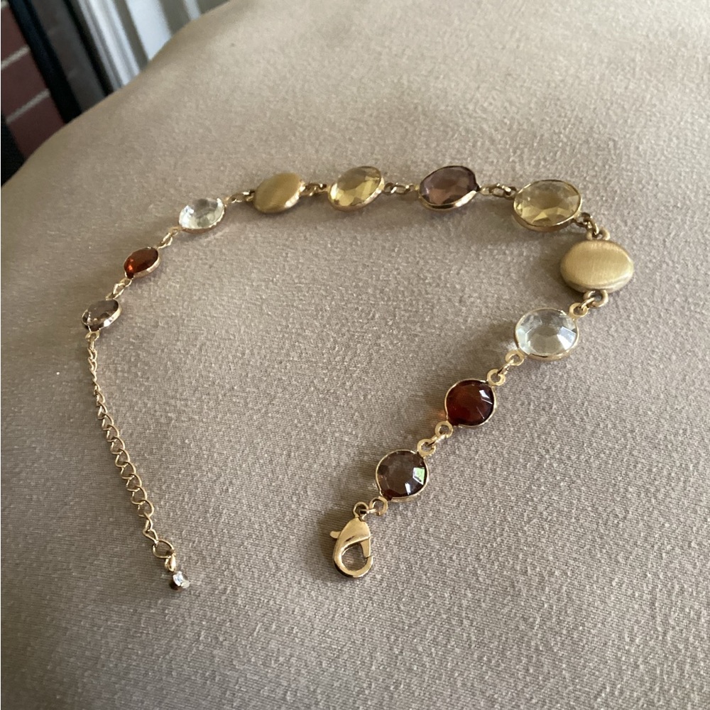 Gold tone, gem bracelet